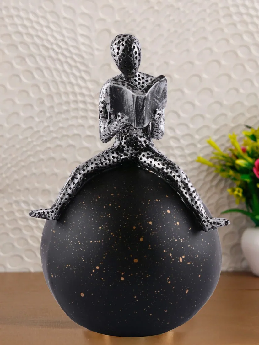 Reading Figure on Sphere Sculpture, photo 1 of 4