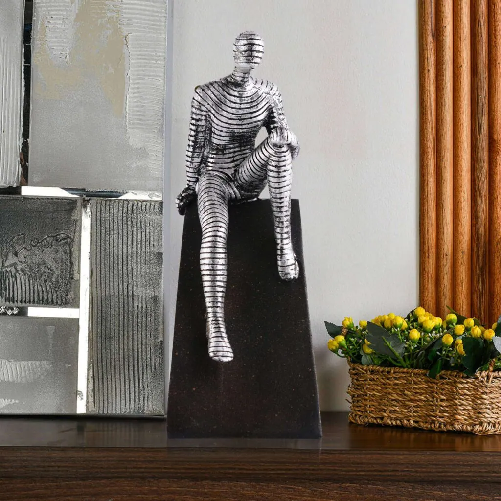 Silver Seated Figure Sculpture, photo 1 of 4