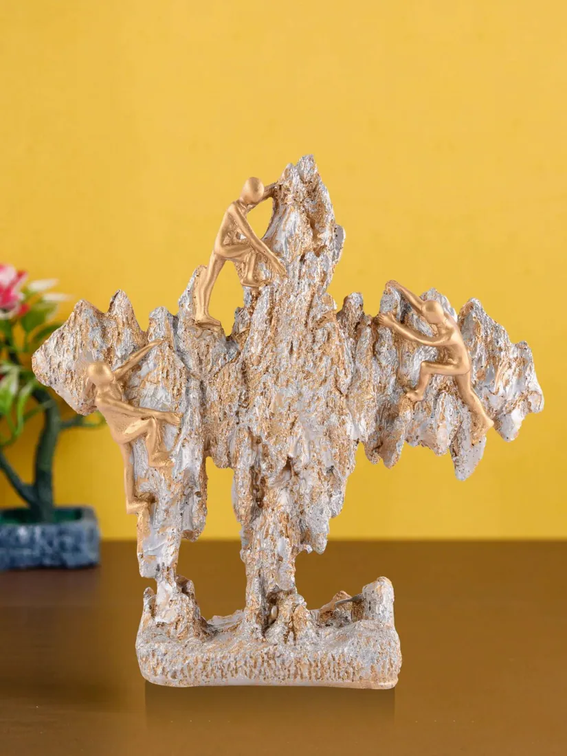 Golden Resin Climbers Sculpture, photo 1 of 4