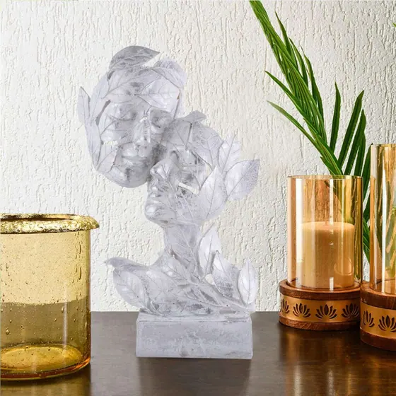 Couple Faces Leaf Resin Statue