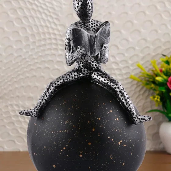 Reading Figure on Sphere Sculpture