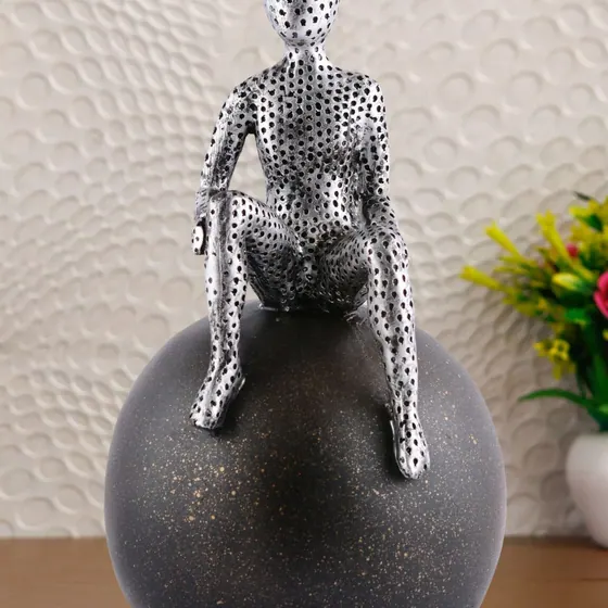 Resin Perforated Figure on Sphere